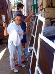 APS Investigator Janet Snow volunteered to paint
