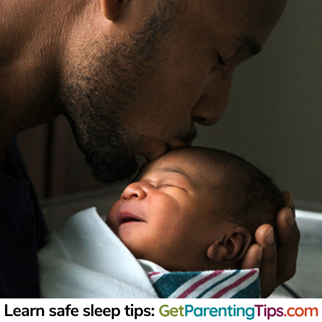 Dad kissing baby tenderly. Text: Learn safe sleep tips: GetParentingTips.com