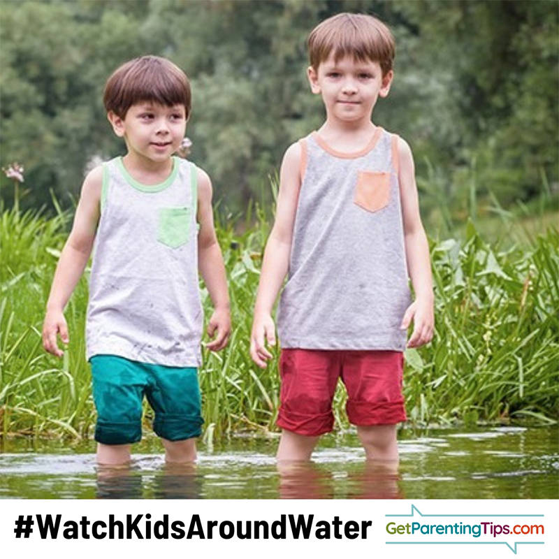 Two kids wading in a creek. Text: #WatchKidsAroundWater GetParentingTips.com