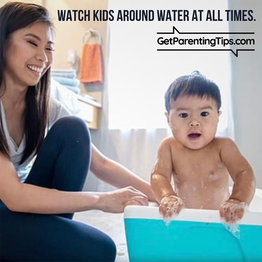 Mom with baby in tub. Text: Watch Kids around water at all times. GetParentingTips.com