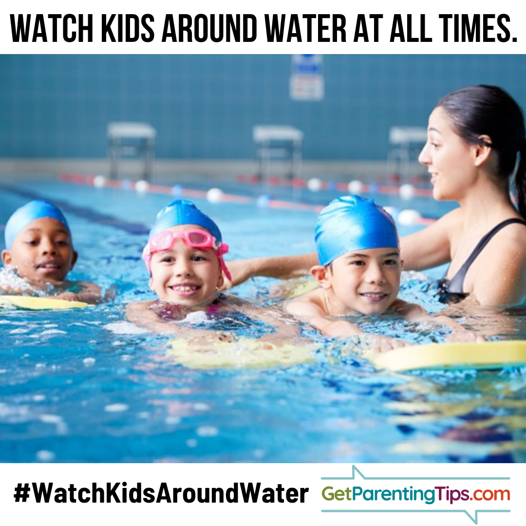 Swim instructor with three kids wearing swim caps. Text: Watch Kids around water at all times! GetParentingTips.com #NationalWaterSafetyMonth