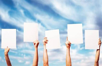 Five hands raised and each holding a sheet of paper 