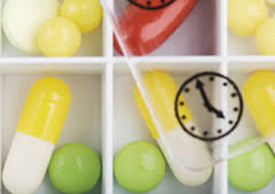 A pillcase with colorful pills in it